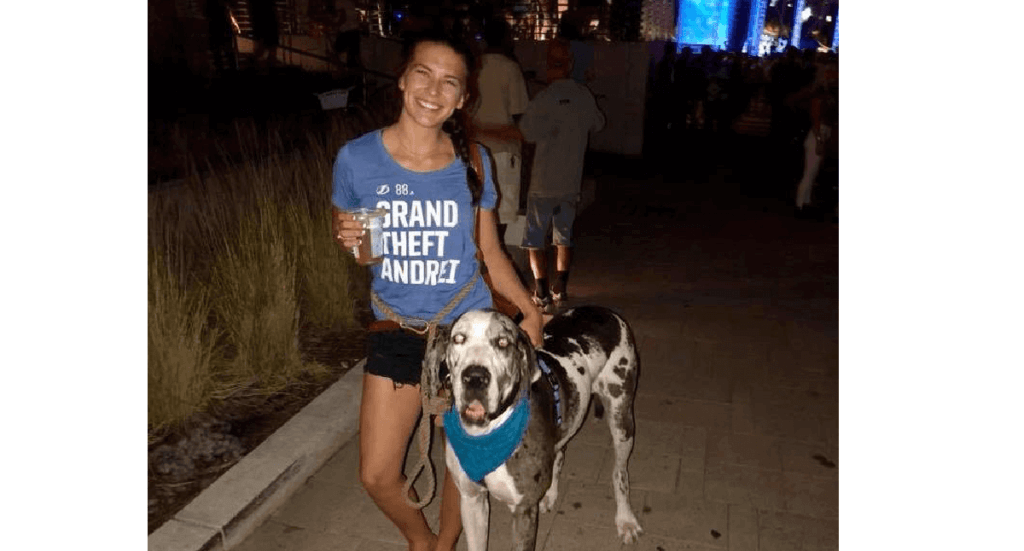 A female and her great dane attend a watch Party for the Tampa Bay Lightning at Curtis Hixon Park Downtown in Tampa