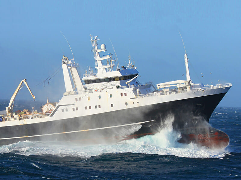 Fishing vessel "American Triumph" wading through ocean waves