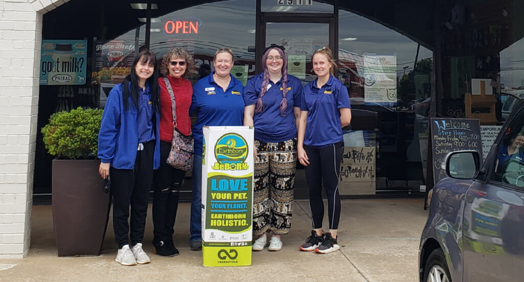 A1 Pet Emporium employees with their ReBorn recycling bin