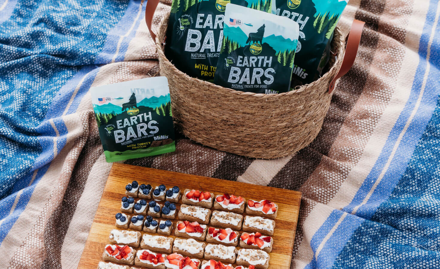 Basket full of EarthBars sits next to an American flag made out of EarthBars