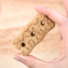 A closeup of an EarthBars dog treat