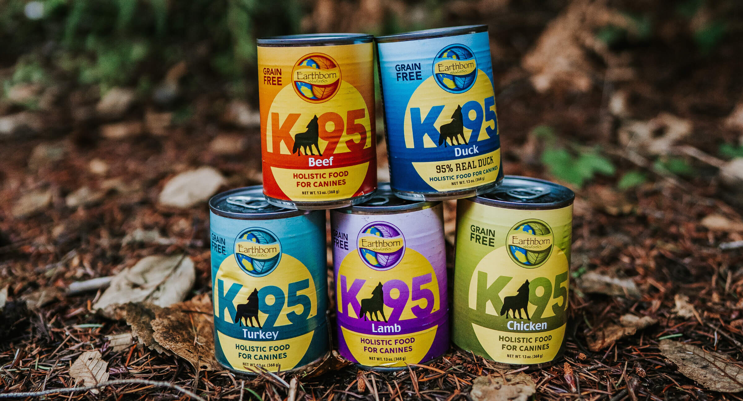 Cans of Earthborn K95 wet dog food